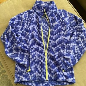 Girls Columbia fleece jacket in two tone purple w/ neon green zipper accents.